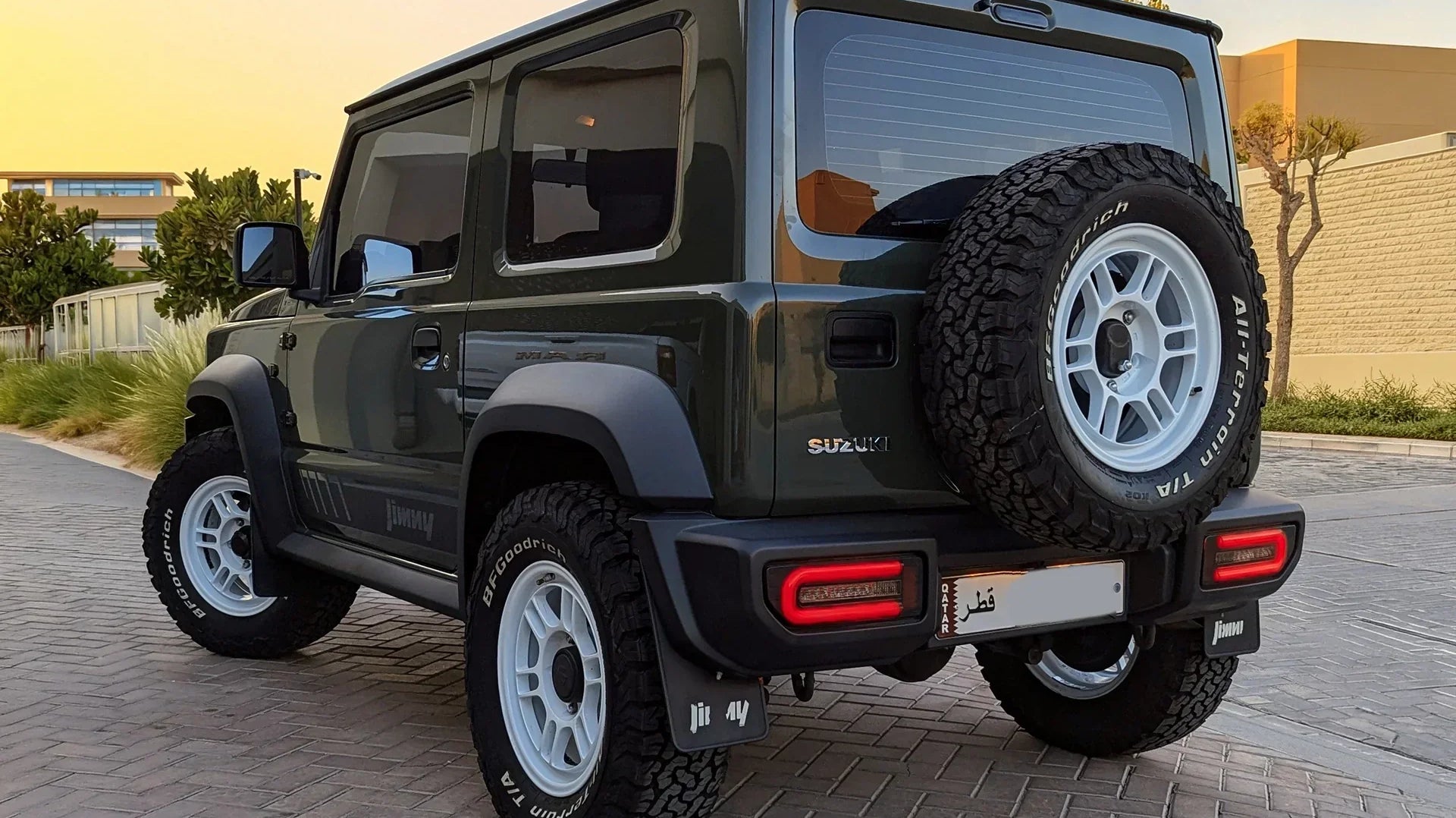 Suzuki Jimny (2018+) with White Enkei Allroad RPT1 Wheels and LED light upgrades.