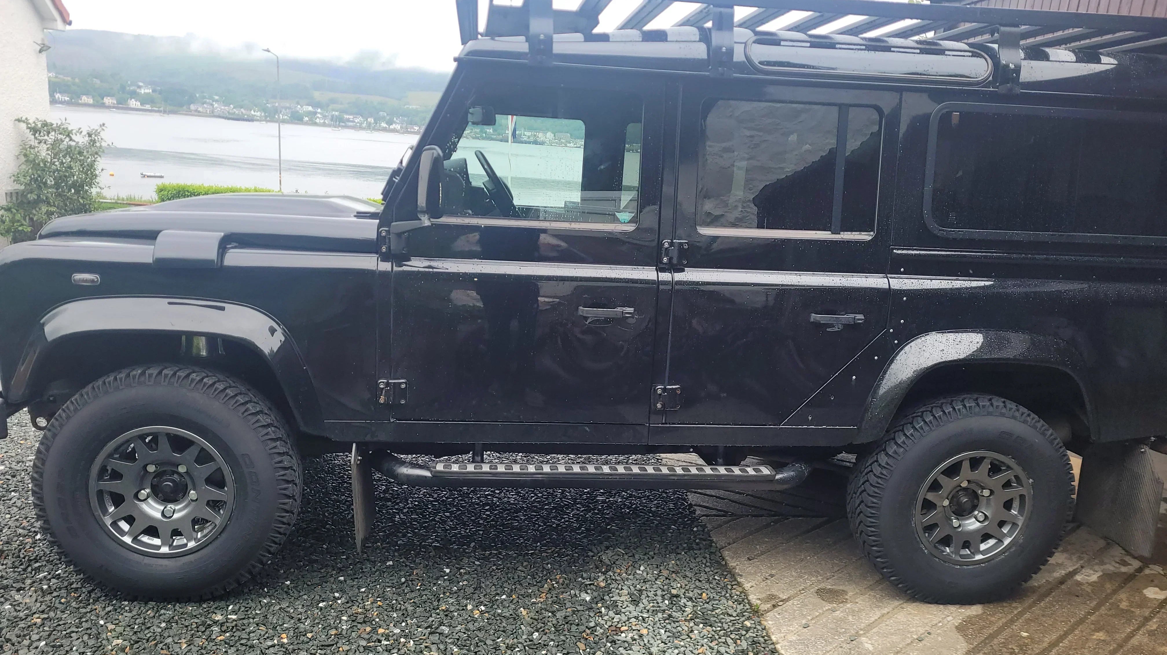 Black Land Rover Defender 110 fitted with EVO Corse DakarZero 16" wheels in Anthracite
