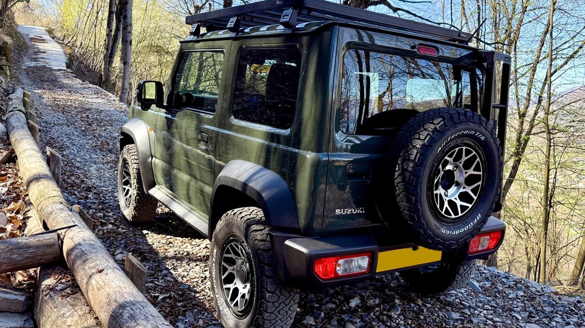 A Jungle Green Suzuki Jimny with 16 inch Magpie M-01 Wheels and a Front Runner Roof Rack!