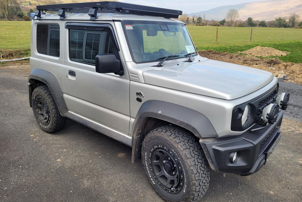 Silver Suzuki Jimny (2018+) fitted with Satin Black XTREME-J XJ07 wheels
