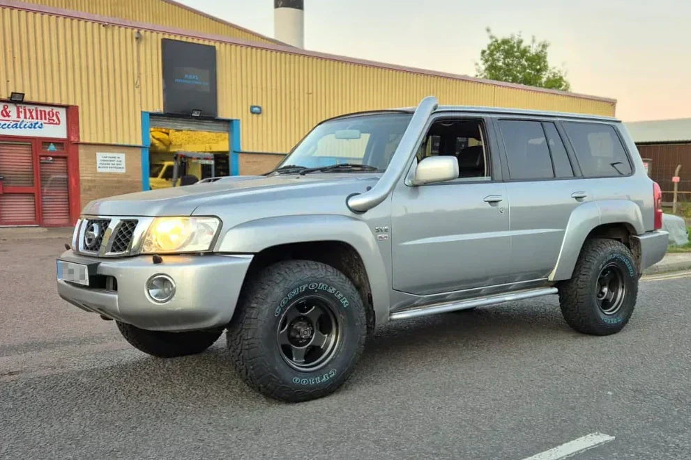 Silver Nissan Patrol Y61 (1997+) fitted with 16" Gunmetallic BRADLEY V wheels and Comforser CF1100 Tyres