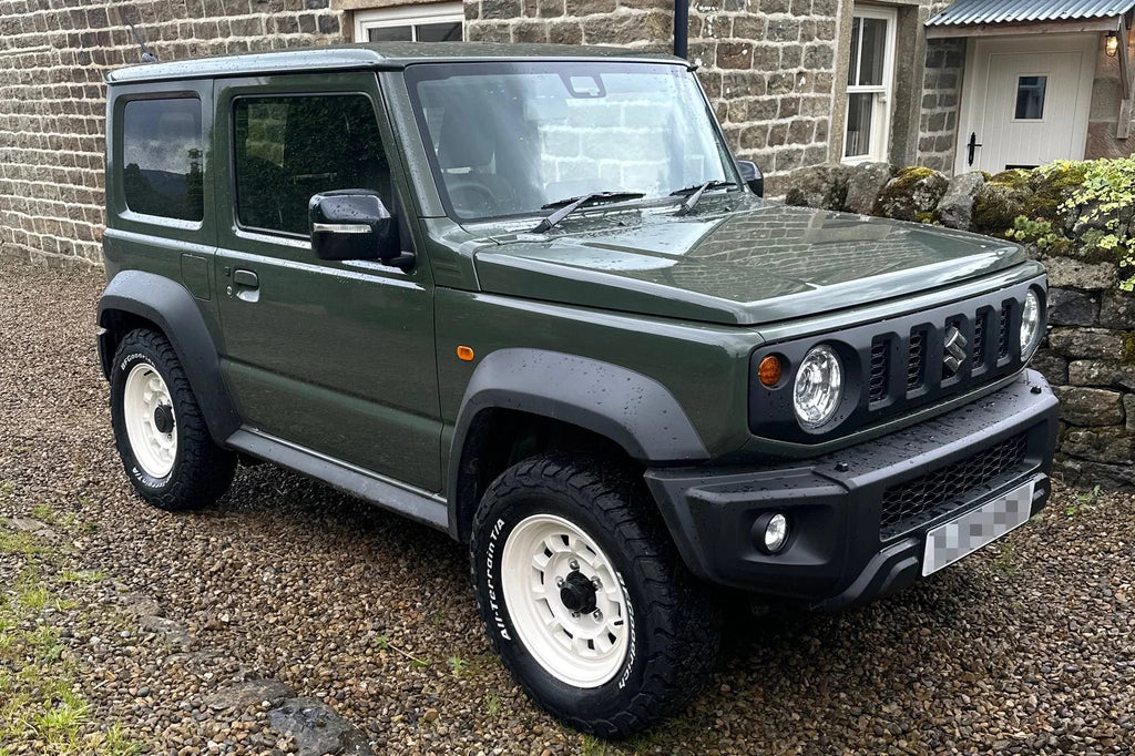 Jungle Green Suzuki Jimny (2018+) with 16" High Peak J-01 wheels in Vintage White and BF Goodrich KO3 tyres