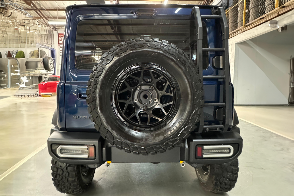 Suzuki Jimny (2023+) 5-Door with 16" Magpie M-01 Wheels with lifted suspension, JimnyStyle LED Tail Lights and other accessories.