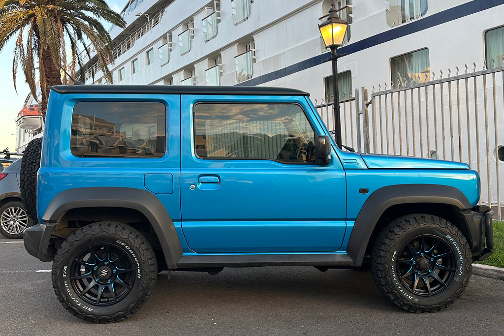 Blue Suzuki Jimny with 16" CST ZERO1 HYPER XJ in Flat Black with Blue Highlights