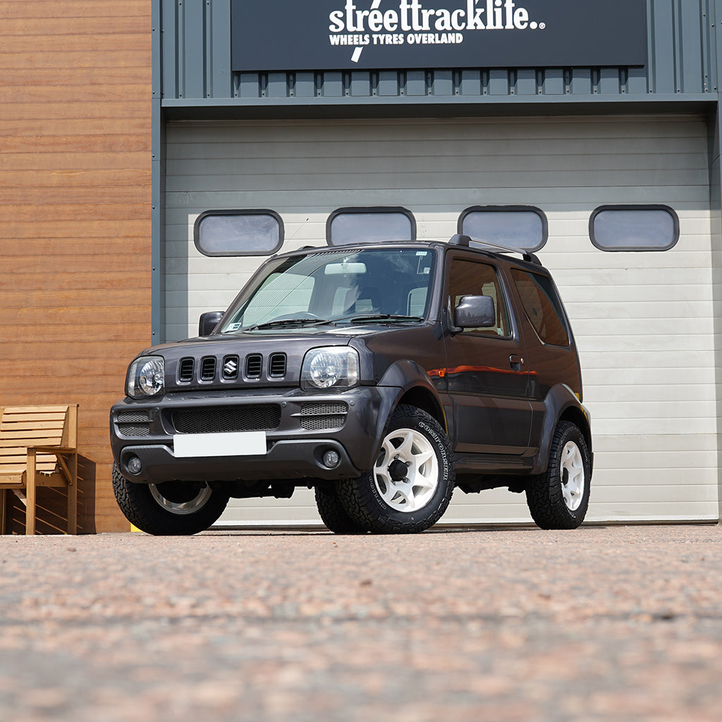 Wheels for Suzuki Jimny JB43 grey metalic car - Vintage White HIGH PEAK J-02 wheels made in Italy. Direct fit for a suzuki Jimny. 